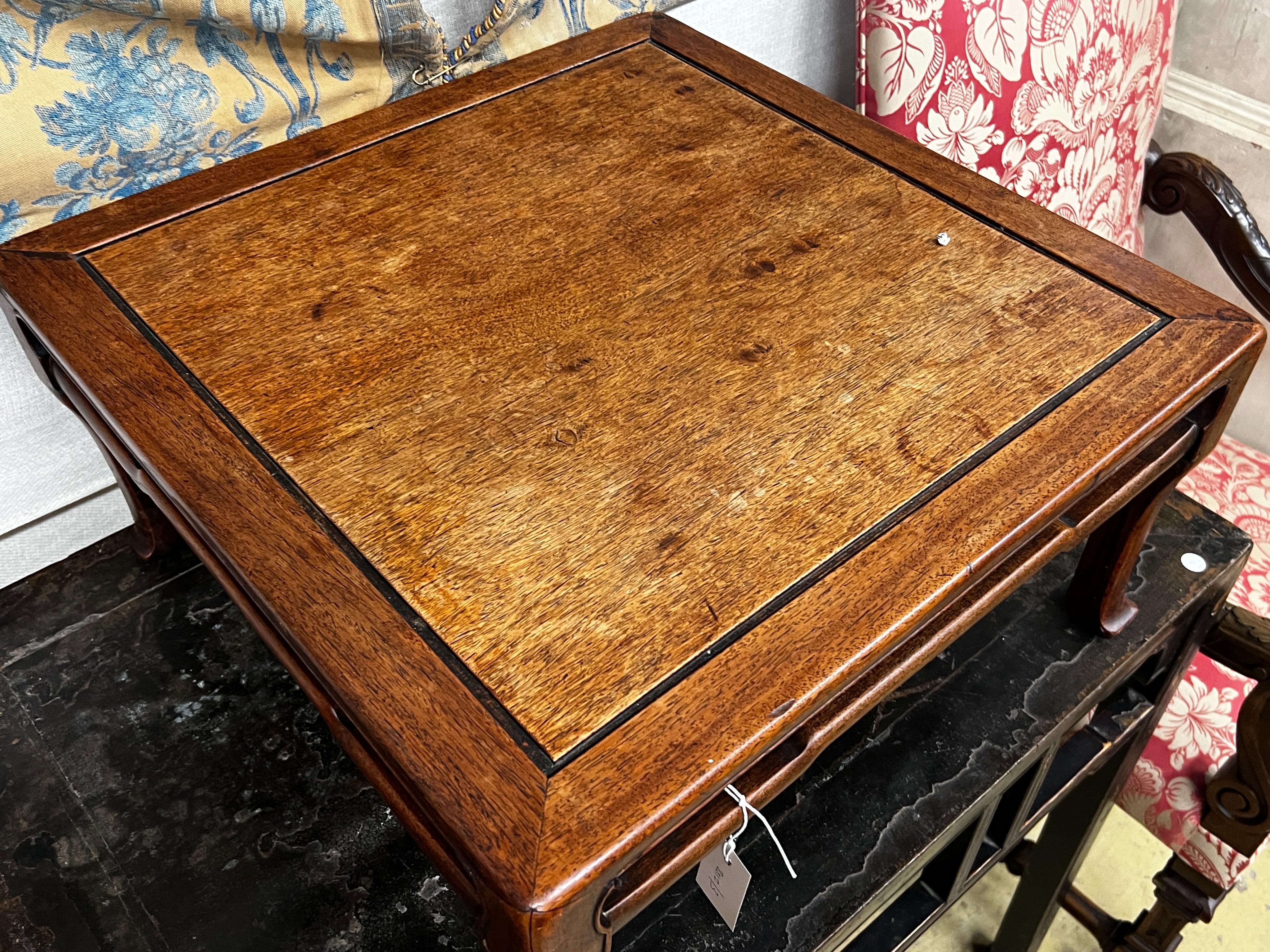 A Chinese carved hardwood square low table, width 59cm, height 29cm